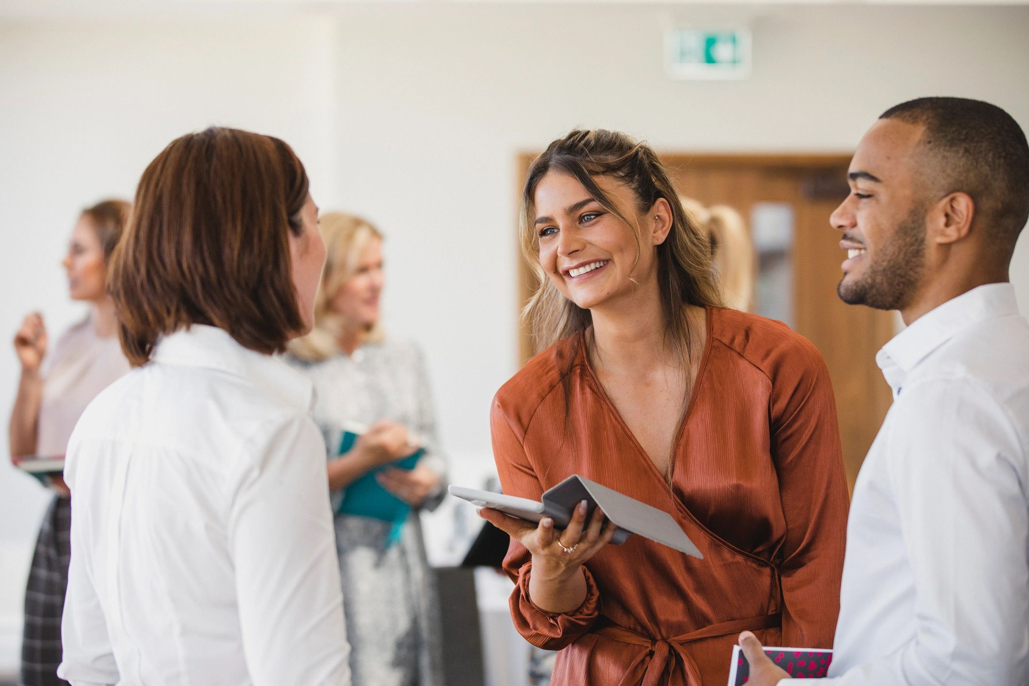 Small business professionals networking in the community